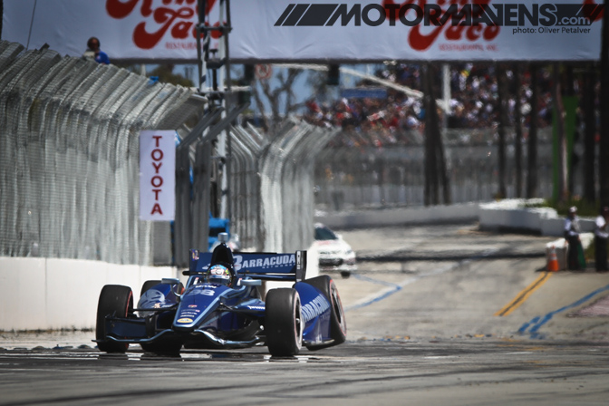 Will Power, Team Penske, Oliver Petalver, Sebastien Bourdais, Lotus Dragon Racing, IndyCar, IZOD, Firestone Indy Lights, American Le Mans Series, ALMS, GoDaddy Racing, Justin Wilson, Honda, Sonny, Firestone, Formula DRIFT, Kyle Mohan, Aurimas Bakchis, Pirelli, Dan Wheldon, Dallara DW12, The Pike, James Hinchcliffe, Danica Patrick, Simona de Silvestro, HVM Racing Lotus, Alex Tagliani, Team Barracuda, Bryan Herta Autosport, Scott Dixon, Target Chip Ganassi Racing, Falken Tire, EJ Viso, KV Racing, Kevin Kalkhoven, Jimmy Vasser, Dyson Racing, Sebastien Bourdais, Lotus Racing Dragon, Toyota Grand Prix of Long Beach, Motormavens